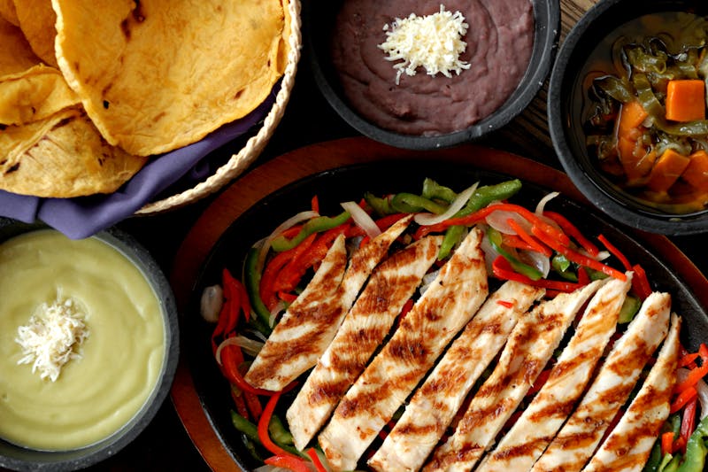Mexican rice and refried beans side at Taco Time