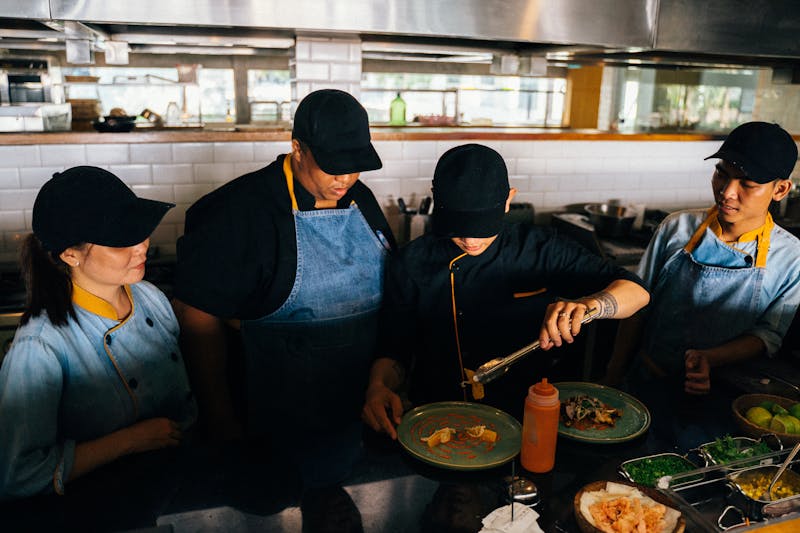 Taco Time team preparing fresh tacos with authentic ingredients